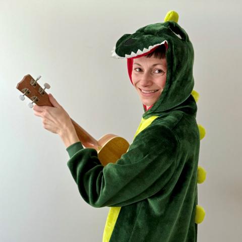 Ingrid Christina in a dinosaur costume